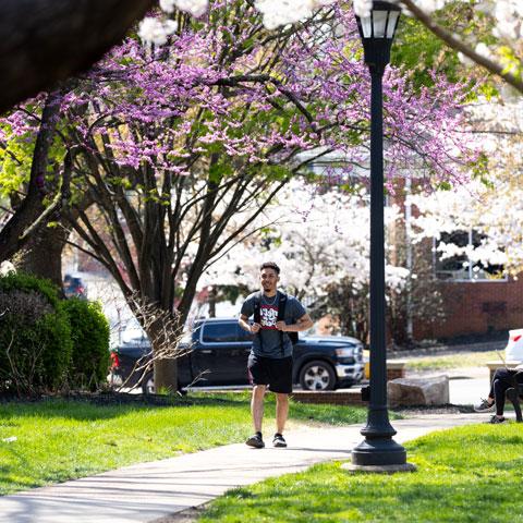 Student walking on campus